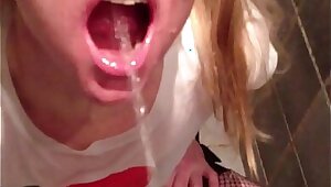 Piss in sluts mouth - and she enjoys drinking it